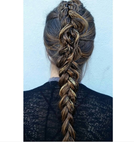 La trenza francesa angulosa diseñada por el artista de Redken, Ashley Lemaster.